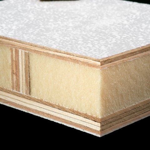 Insulated fiberglass panel with pebble grain gel coat finish