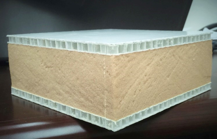 Honeycomb-foam-honeycomb insulated panel